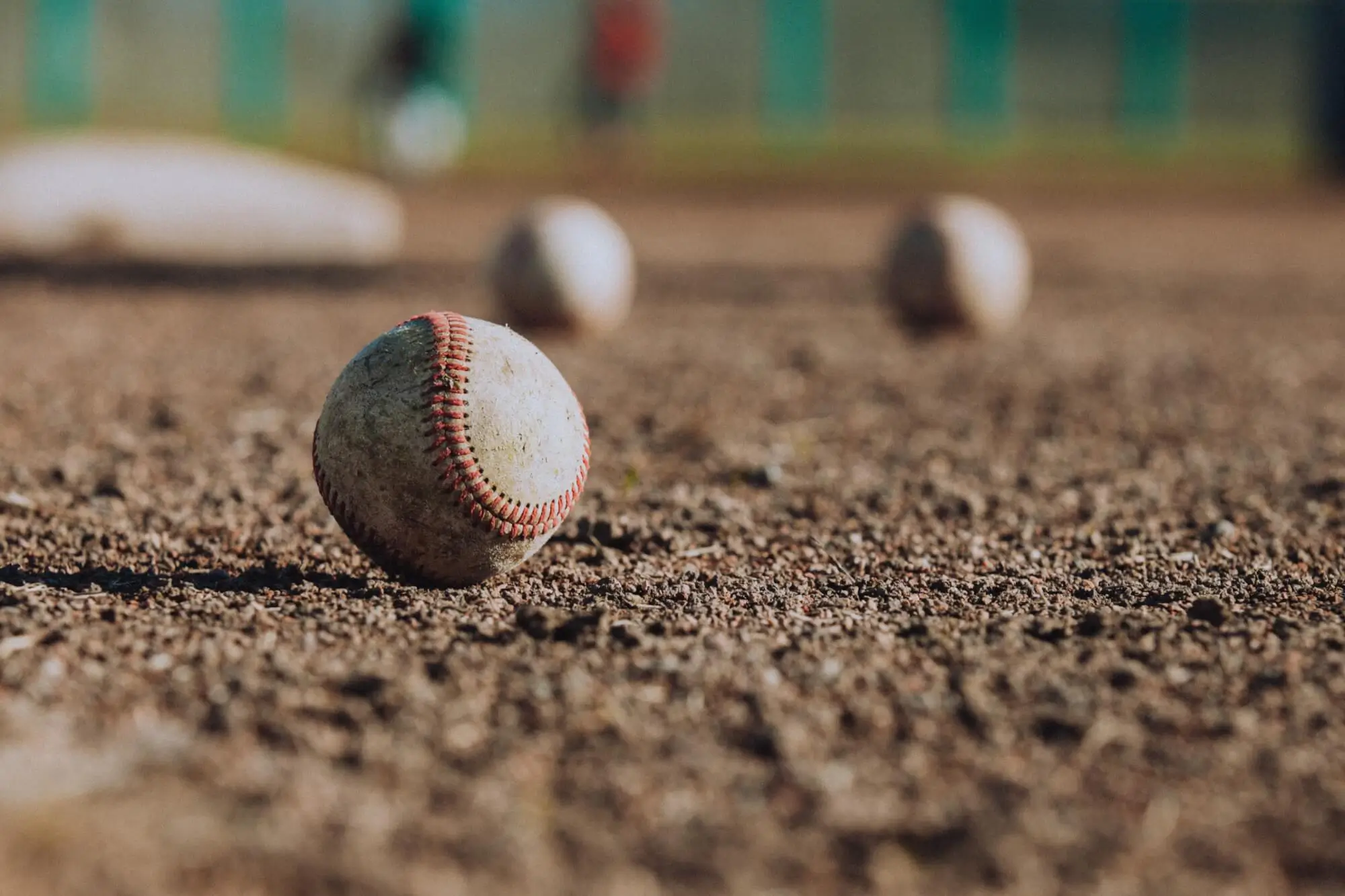 Close-up of baseballs on a field
